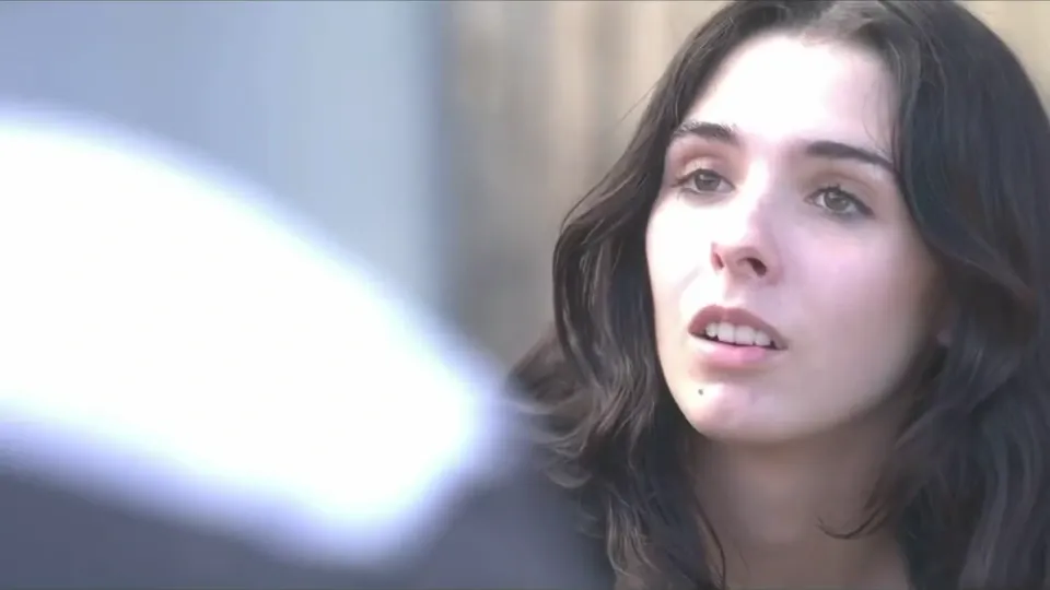 Elisabeth Fitzgerald outdoors, looking up at someone off camera